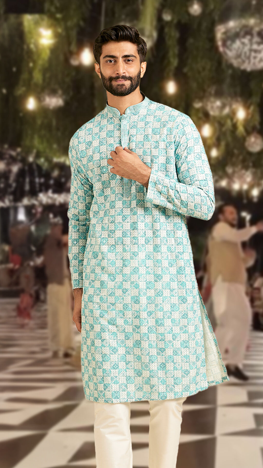 Man flaunting blue printed kurta pajama 